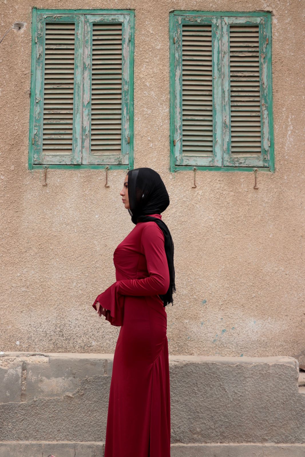Sculpted dress in Burgundy.