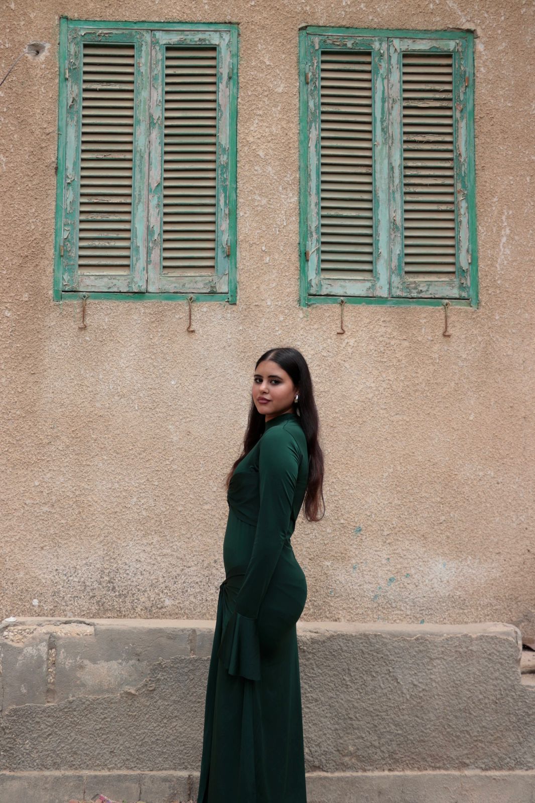 Sculpted dress in Emerald Green.