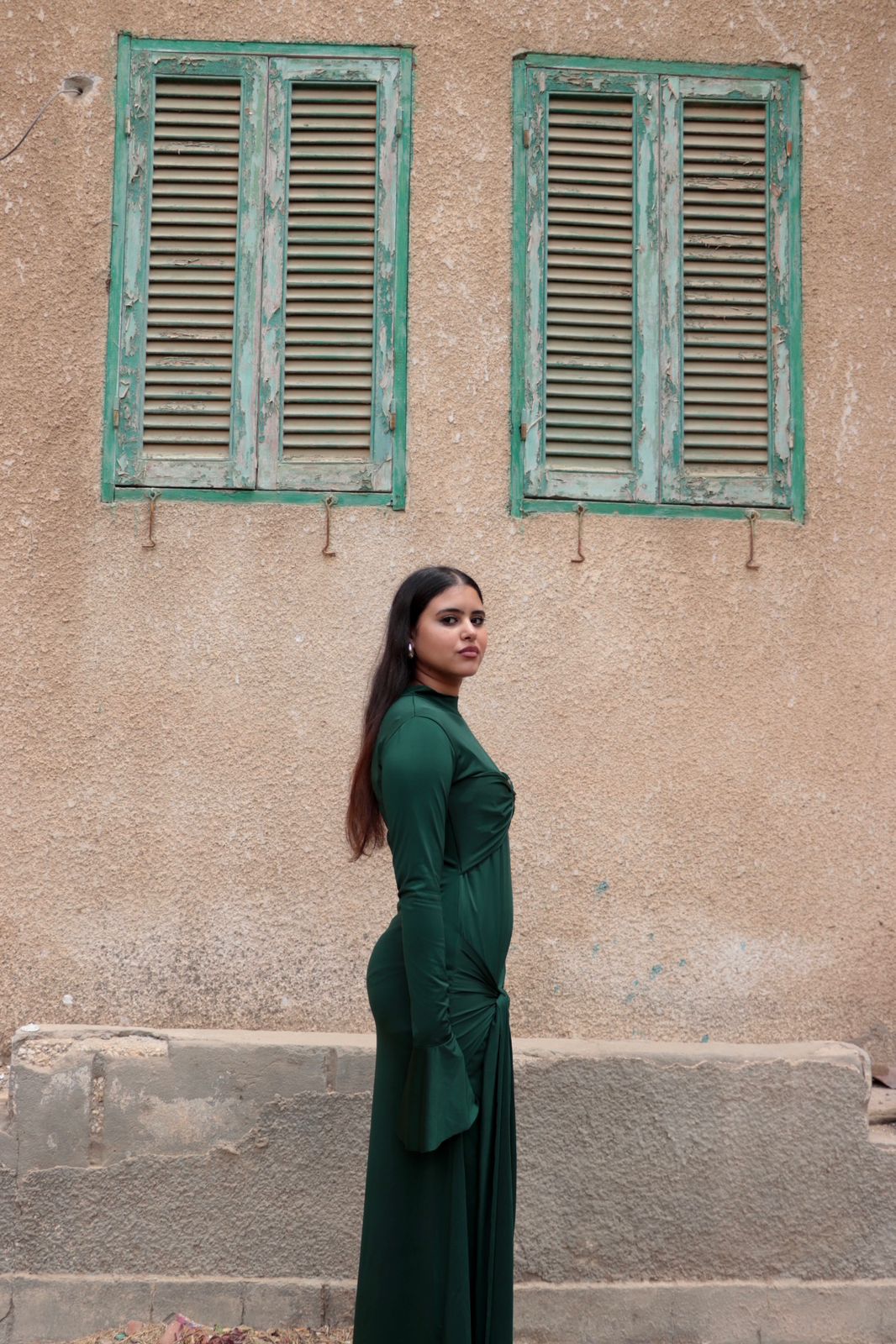 Sculpted dress in Emerald Green.