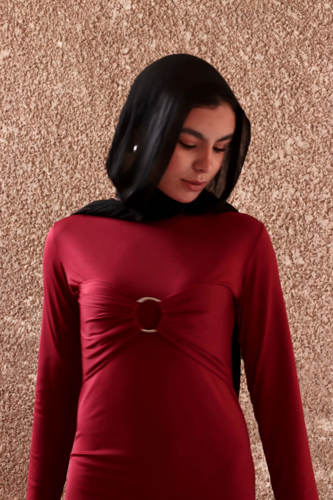 Sculpted dress in Burgundy.