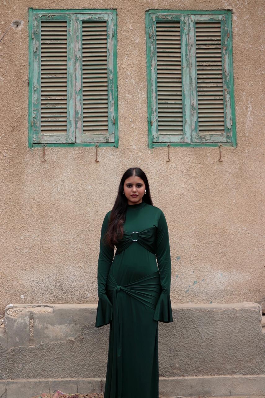 Sculpted dress in Emerald Green.
