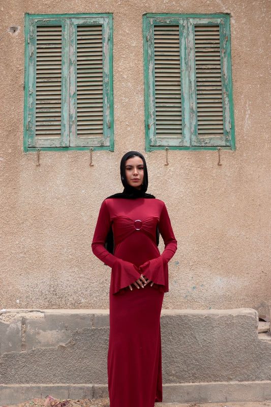Sculpted dress in Burgundy.